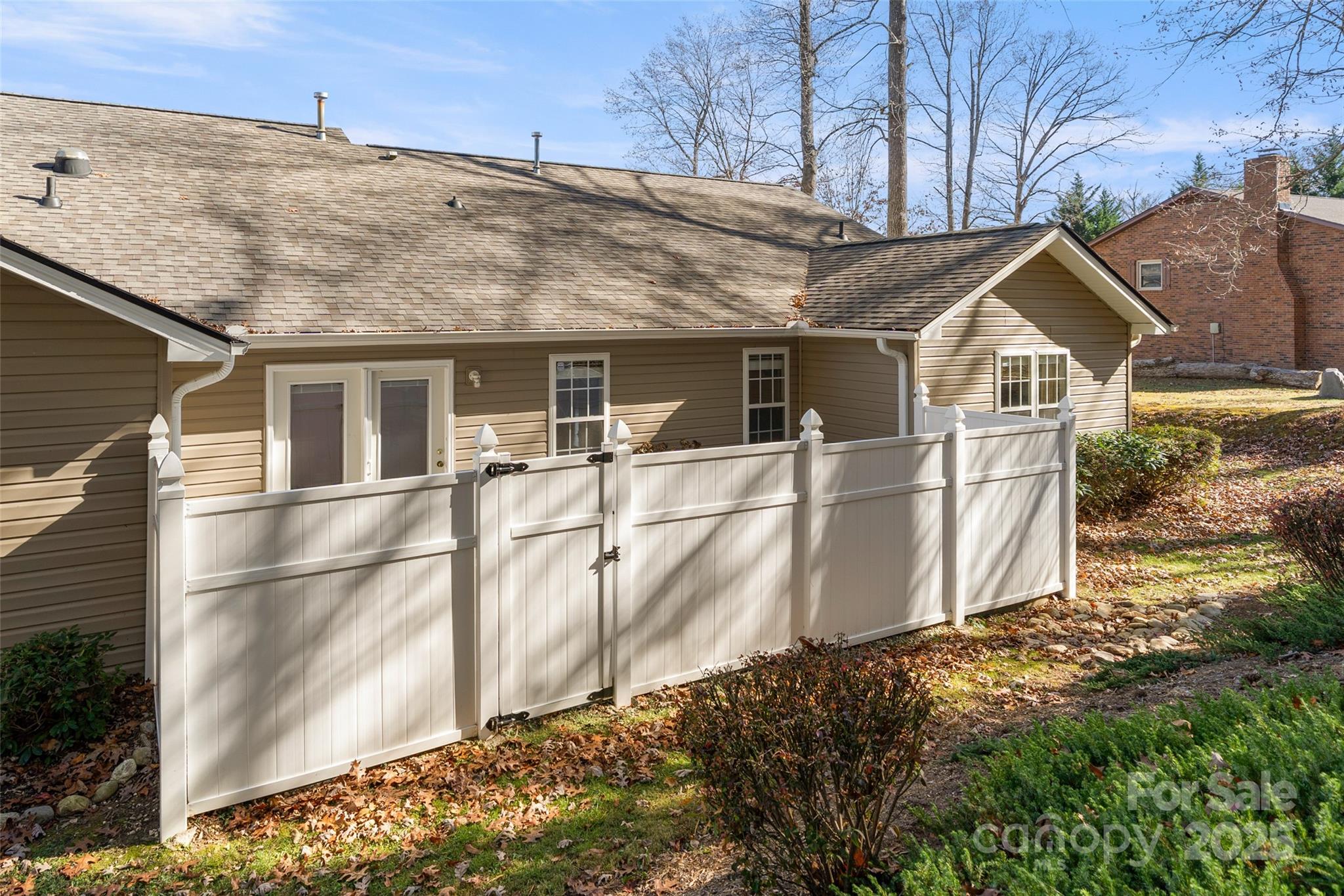 270 Farington Circle Fletcher, NC 28732 - Photo 22 of 29 a view of a house with large windows