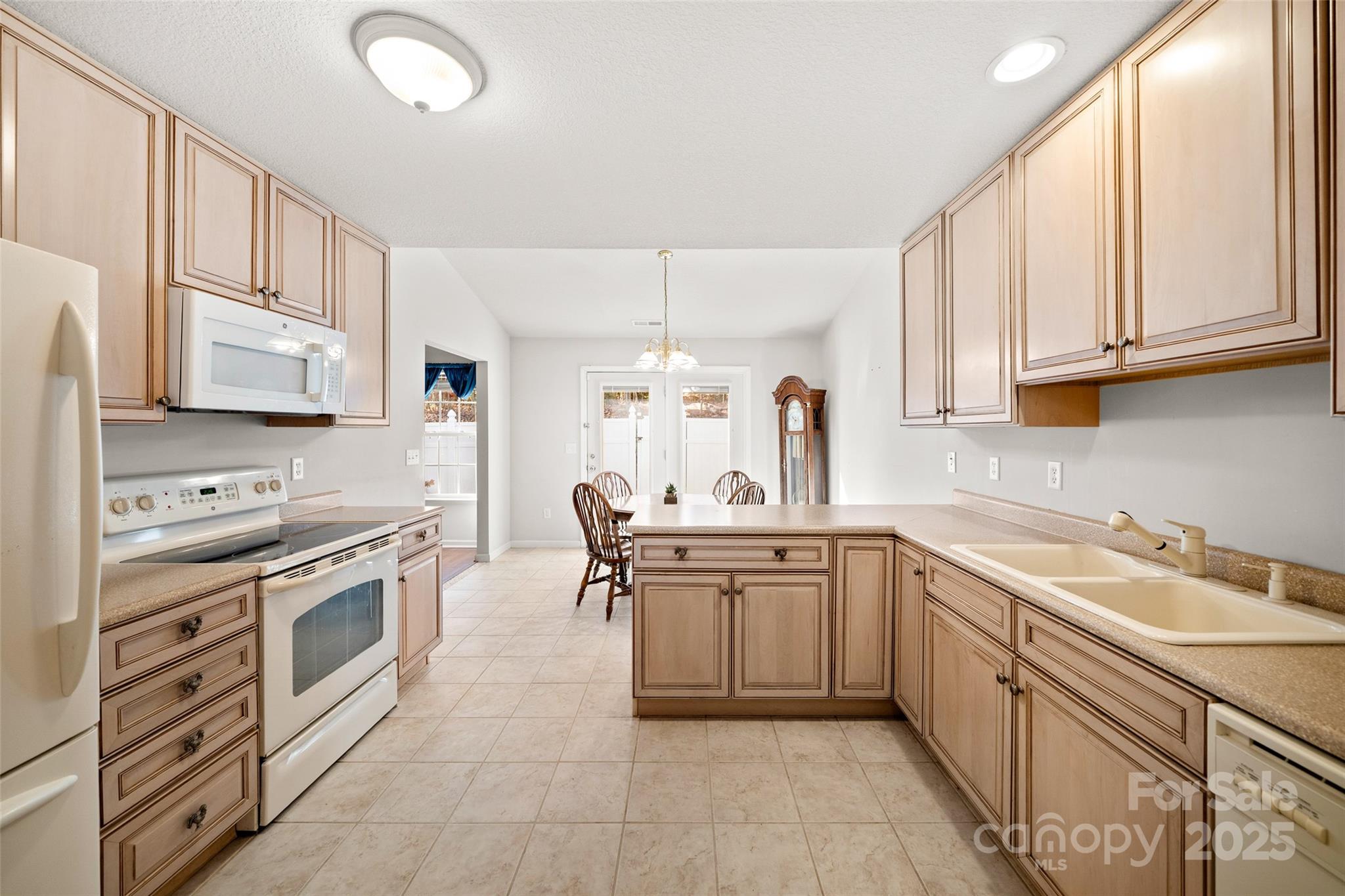 270 Farington Circle Fletcher, NC 28732 - Photo 26 of 29 a kitchen with a sink stove and cabinets