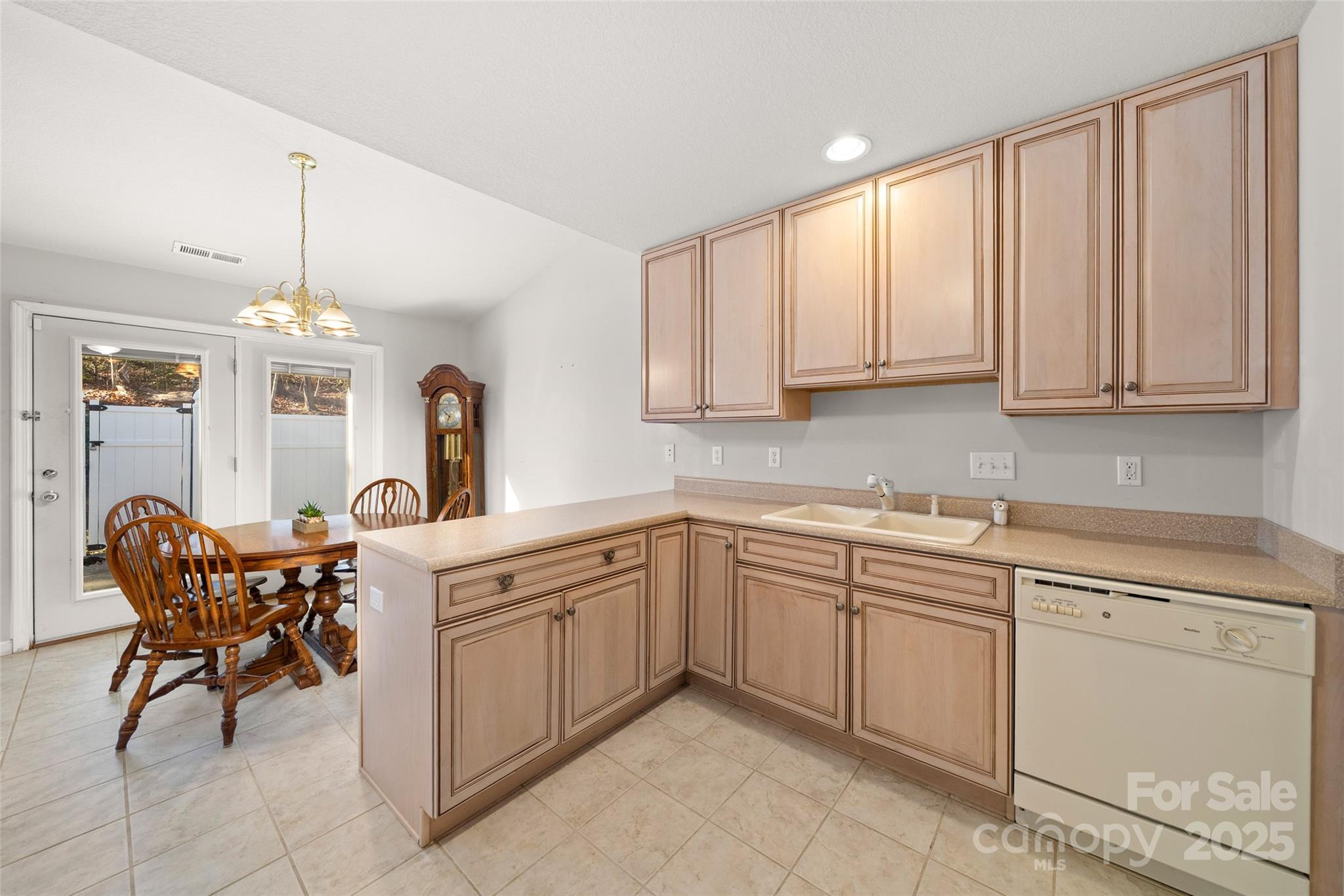 270 Farington Circle Fletcher, NC 28732 - Photo 27 of 29 a kitchen with stainless steel appliances granite countertop a white cabinets and a sink