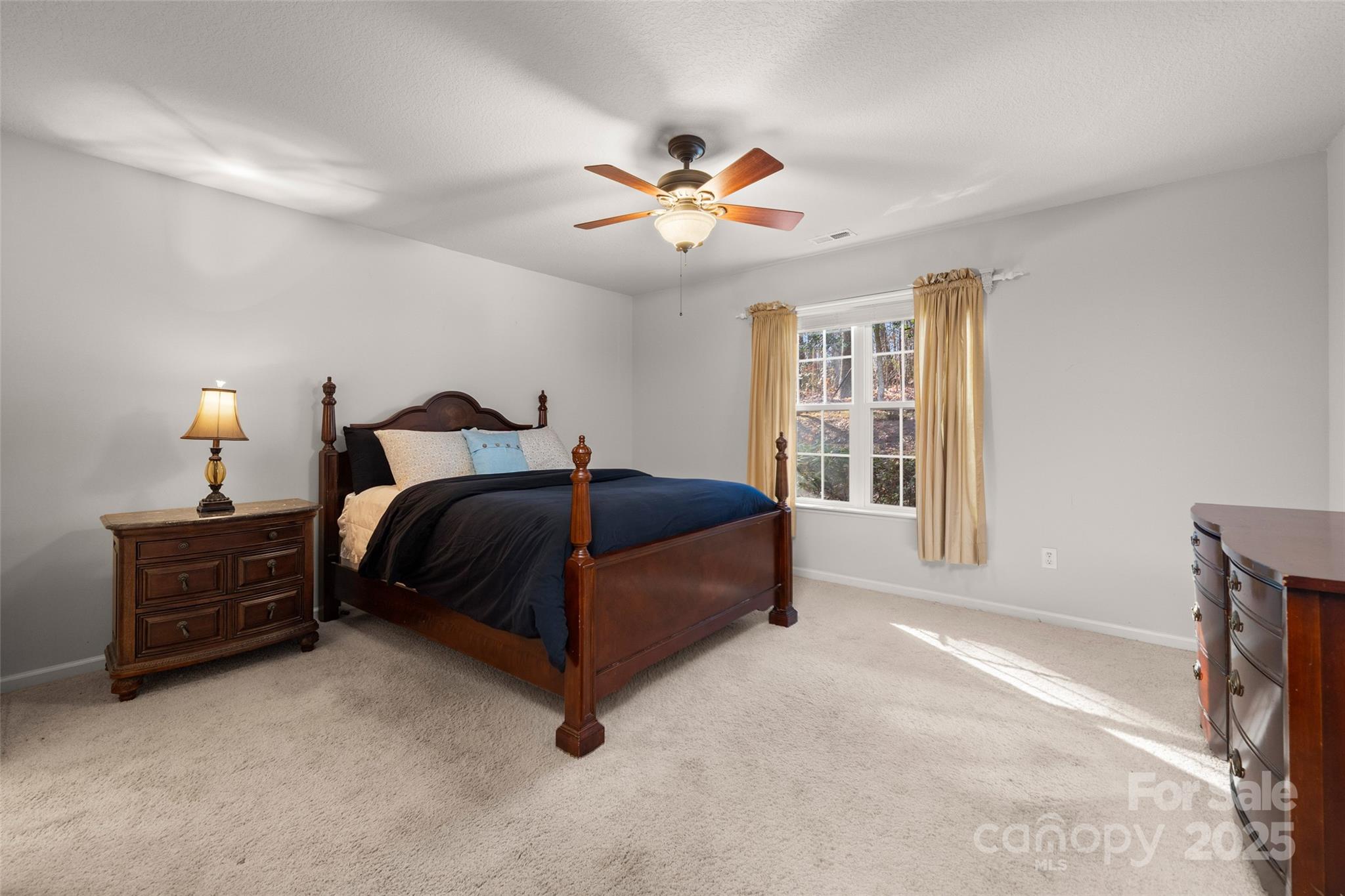 270 Farington Circle Fletcher, NC 28732 - Photo 8 of 29 a bedroom with a bed dresser and a window