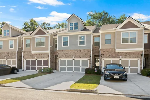 a car parked in front of a house