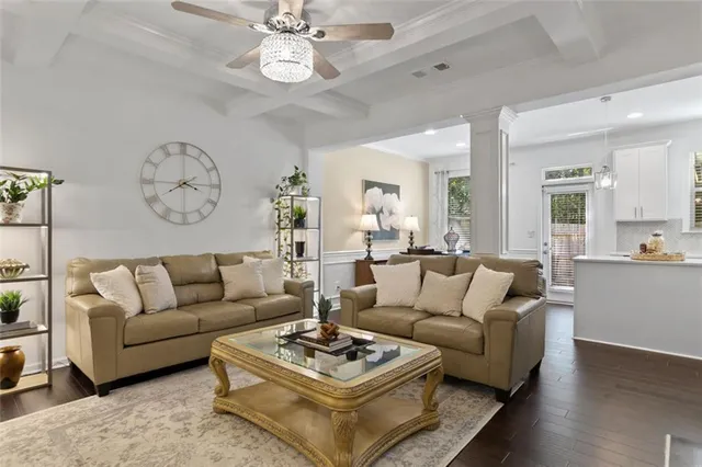 a living room with furniture and a table