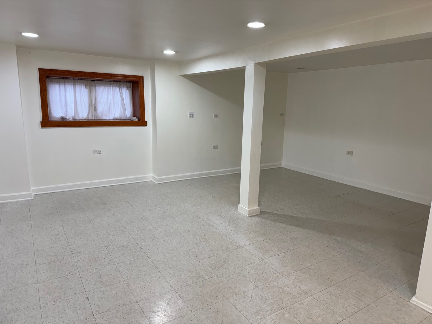 2434 West Pershing Road Chicago, IL 60632 - Photo 2 of 12 an empty room with windows and closet