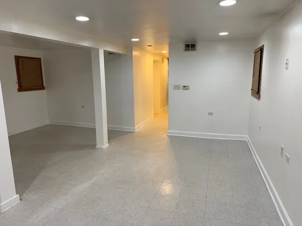 an empty room with a natural light