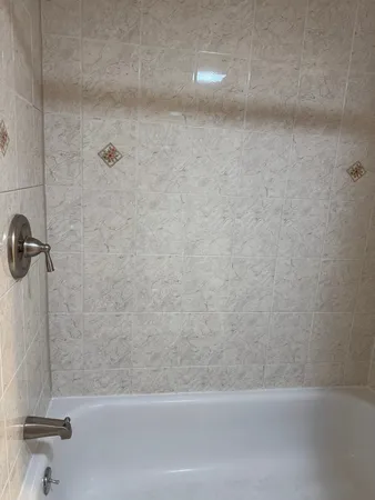 a bathroom with a bathtub