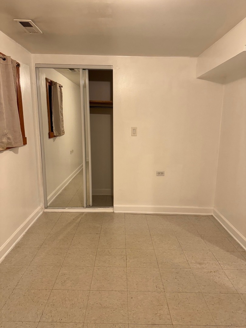 2434 West Pershing Road Chicago, IL 60632 - Photo 10 of 12 a view of an empty room