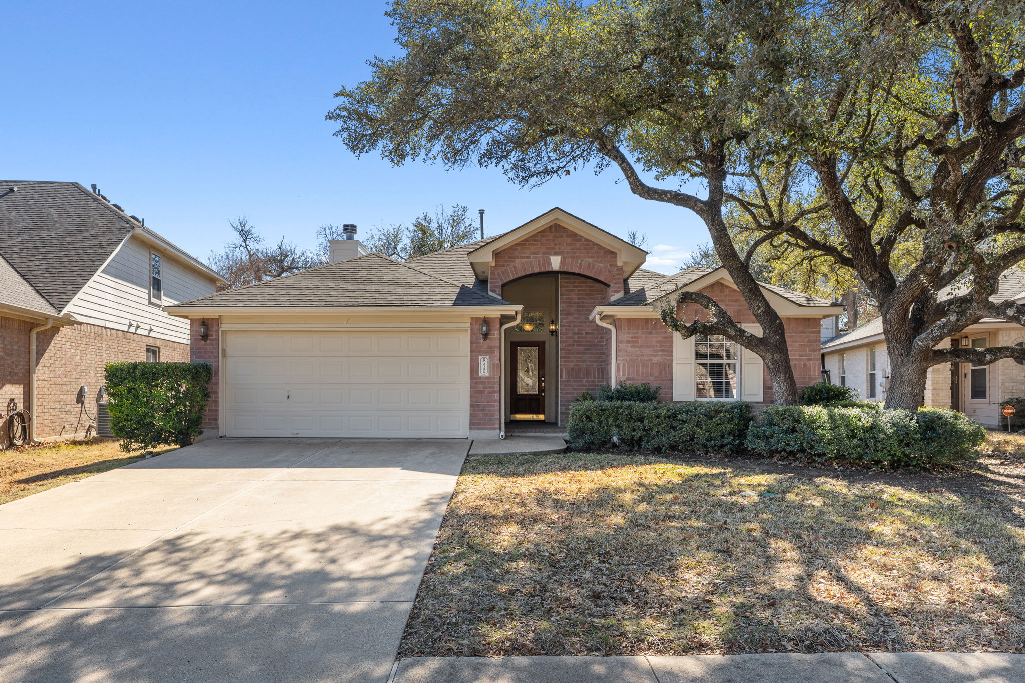 2306 Clover Ridge Drive Cedar Park, TX 78613 - Photo 2 of 29 a front view of a house with a yard and garage