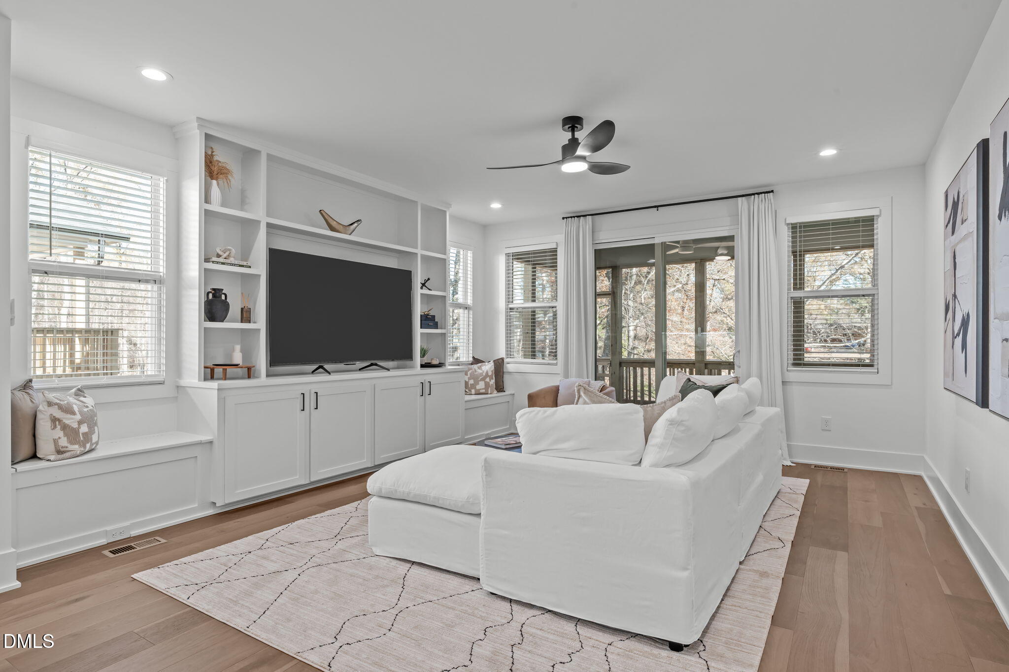 637 Conover Road, Unit A Durham, NC 27703 - Photo 15 of 51 a living room with furniture and a flat screen tv