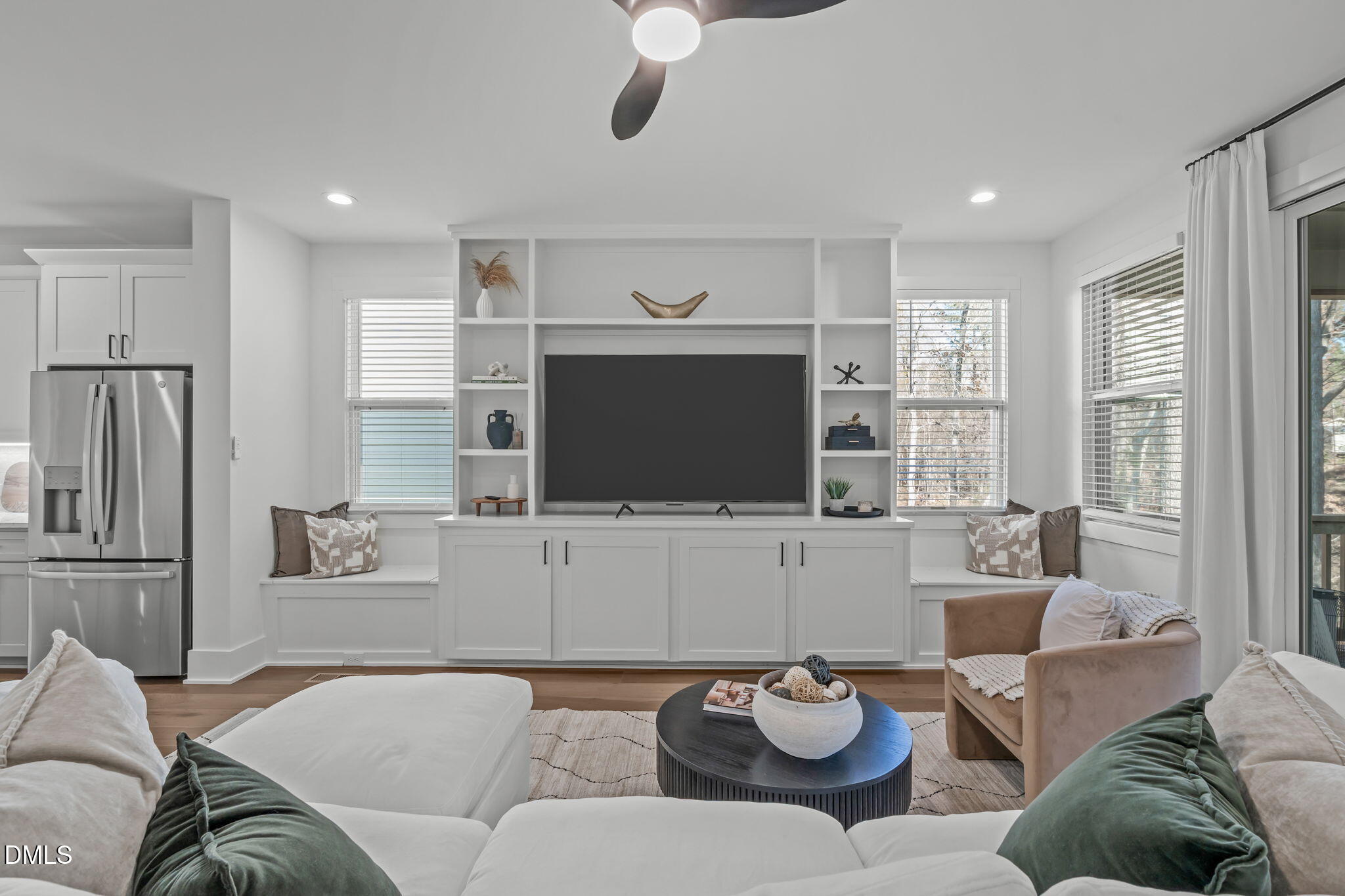 637 Conover Road, Unit A Durham, NC 27703 - Photo 17 of 51 a living room with furniture and a flat screen tv