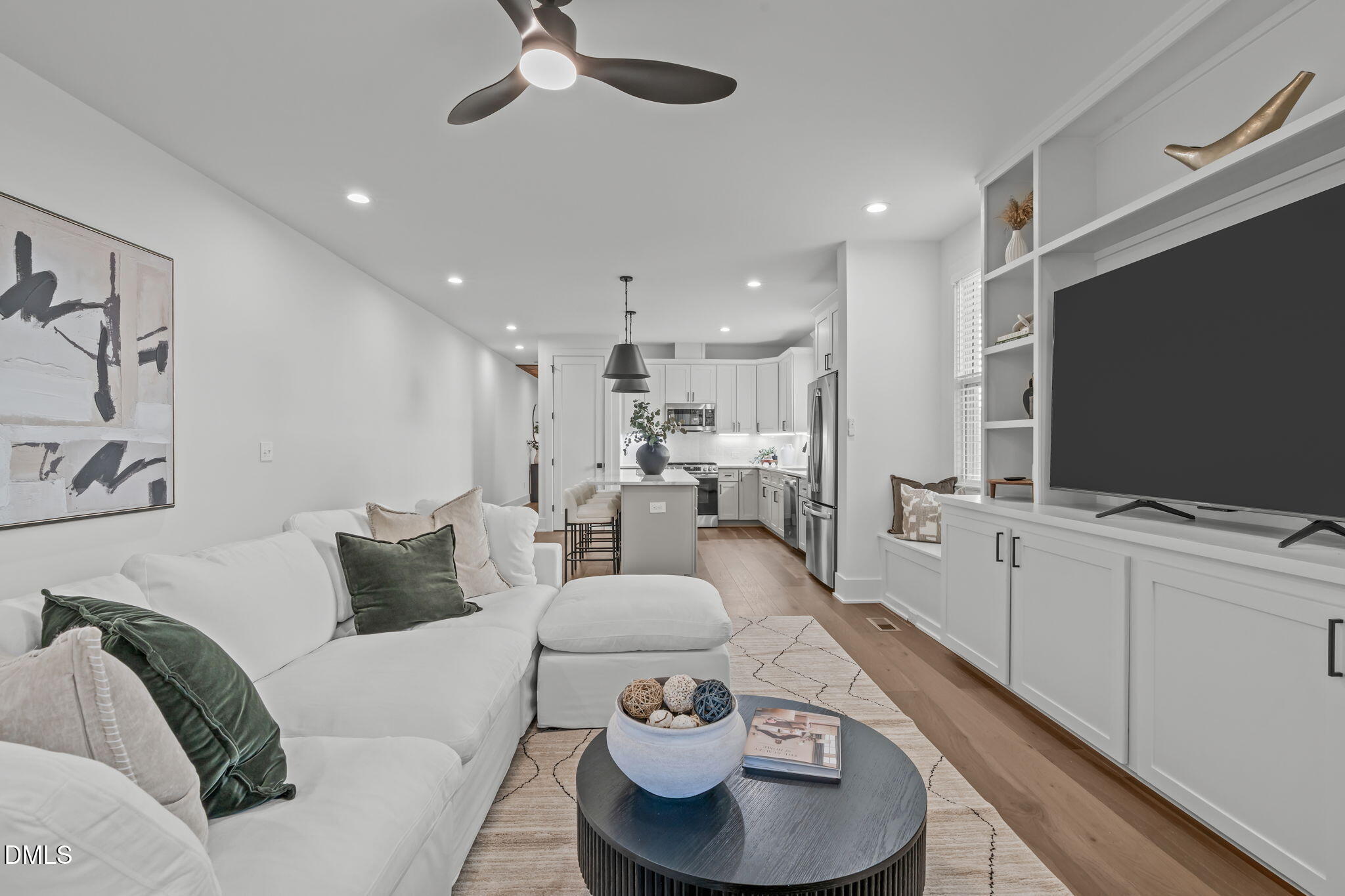 637 Conover Road, Unit A Durham, NC 27703 - Photo 19 of 51 a living room with furniture and a flat screen tv