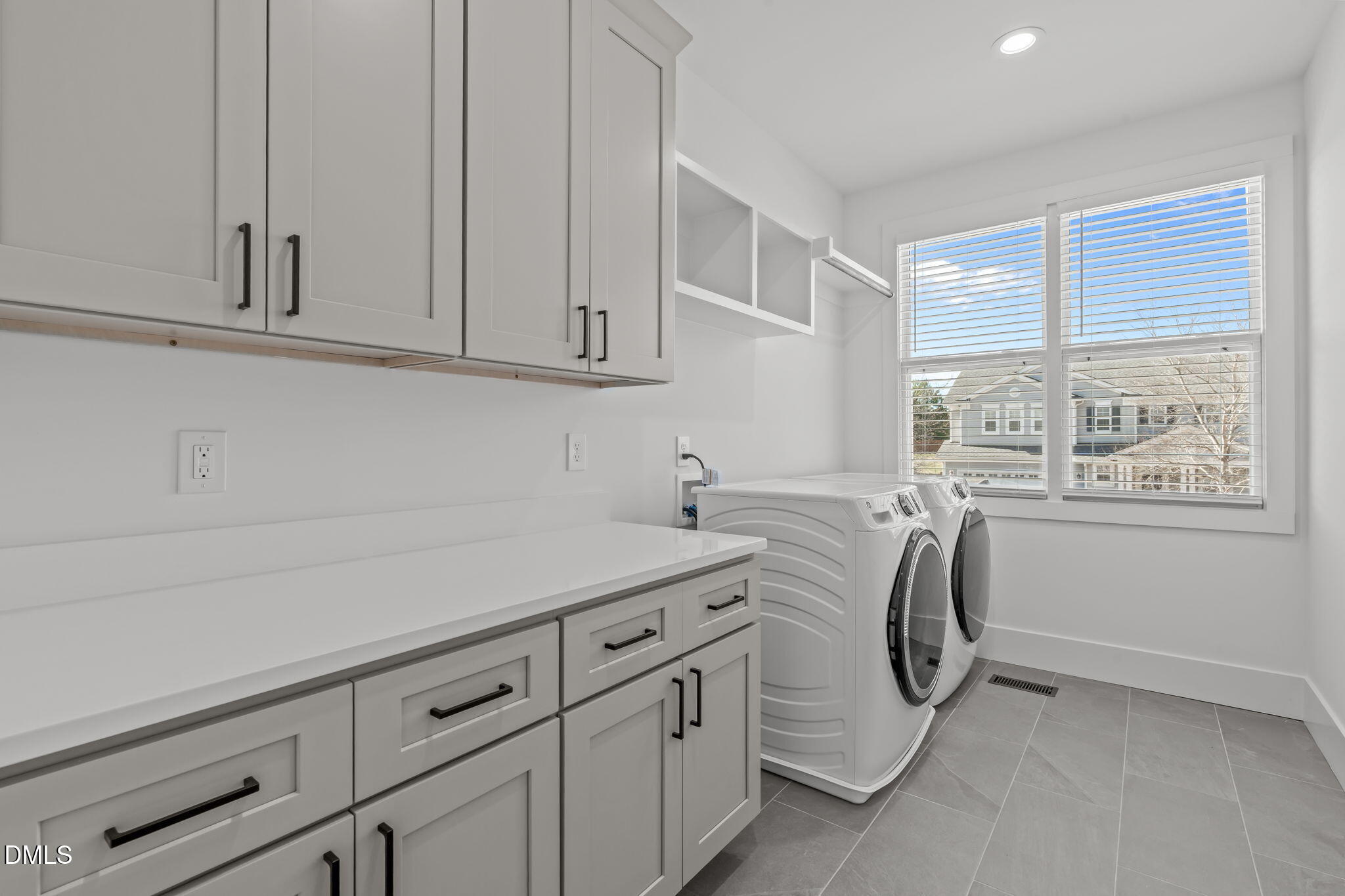 637 Conover Road, Unit A Durham, NC 27703 - Photo 41 of 51 a view of a kitchen with white cabinets