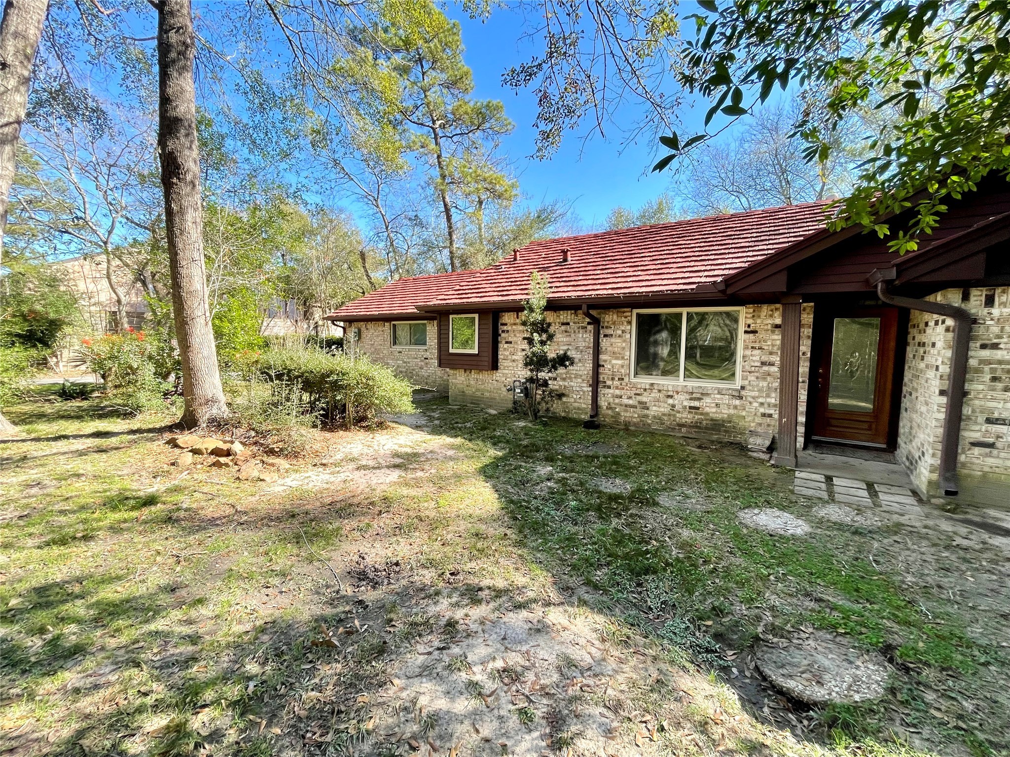 216 Woerner Road Houston, TX 77090 - Photo 2 of 33 a front view of a house with a yard