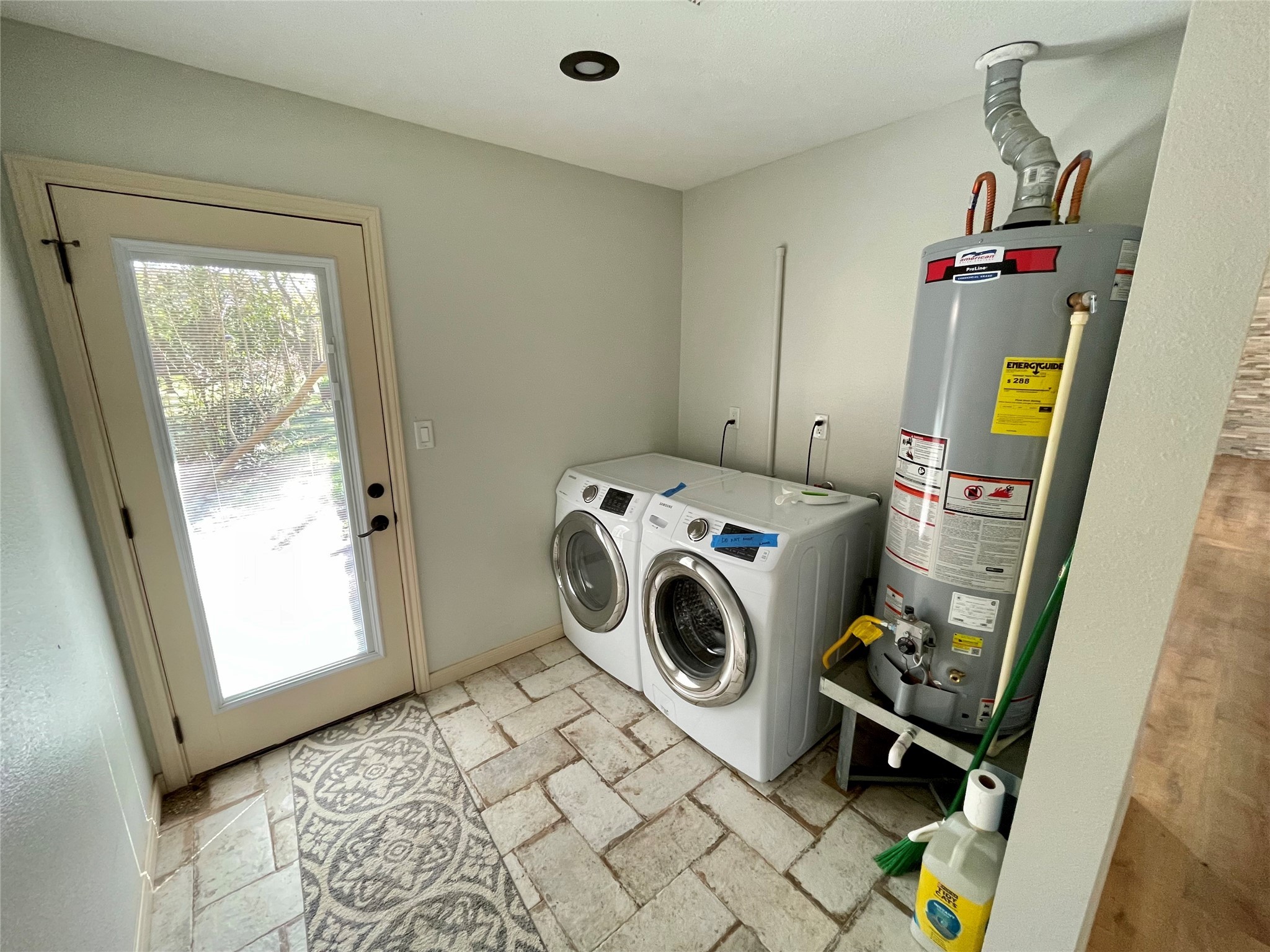216 Woerner Road Houston, TX 77090 - Photo 22 of 33 a utility room with dryer and washer
