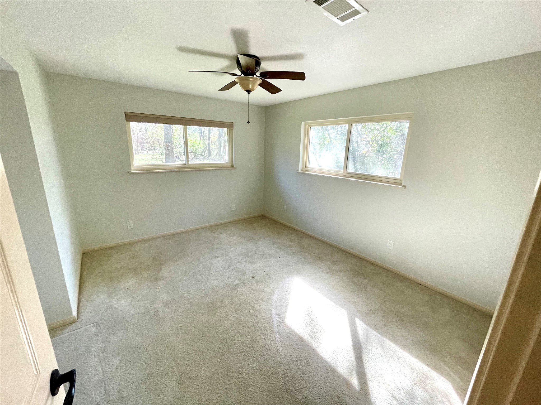 216 Woerner Road Houston, TX 77090 - Photo 30 of 33 a view of room with a ceiling fan and window