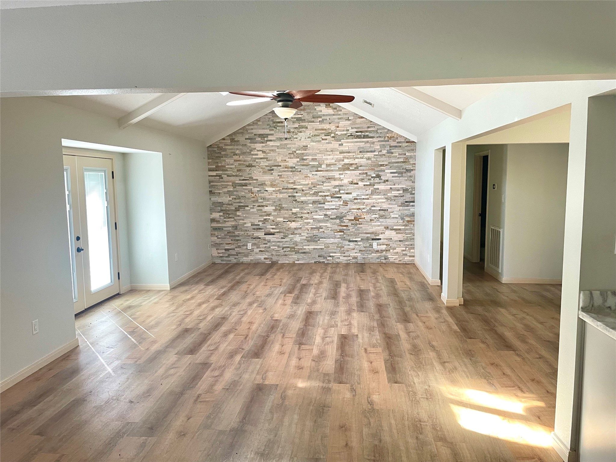 216 Woerner Road Houston, TX 77090 - Photo 8 of 33 a view of empty room with wooden floor