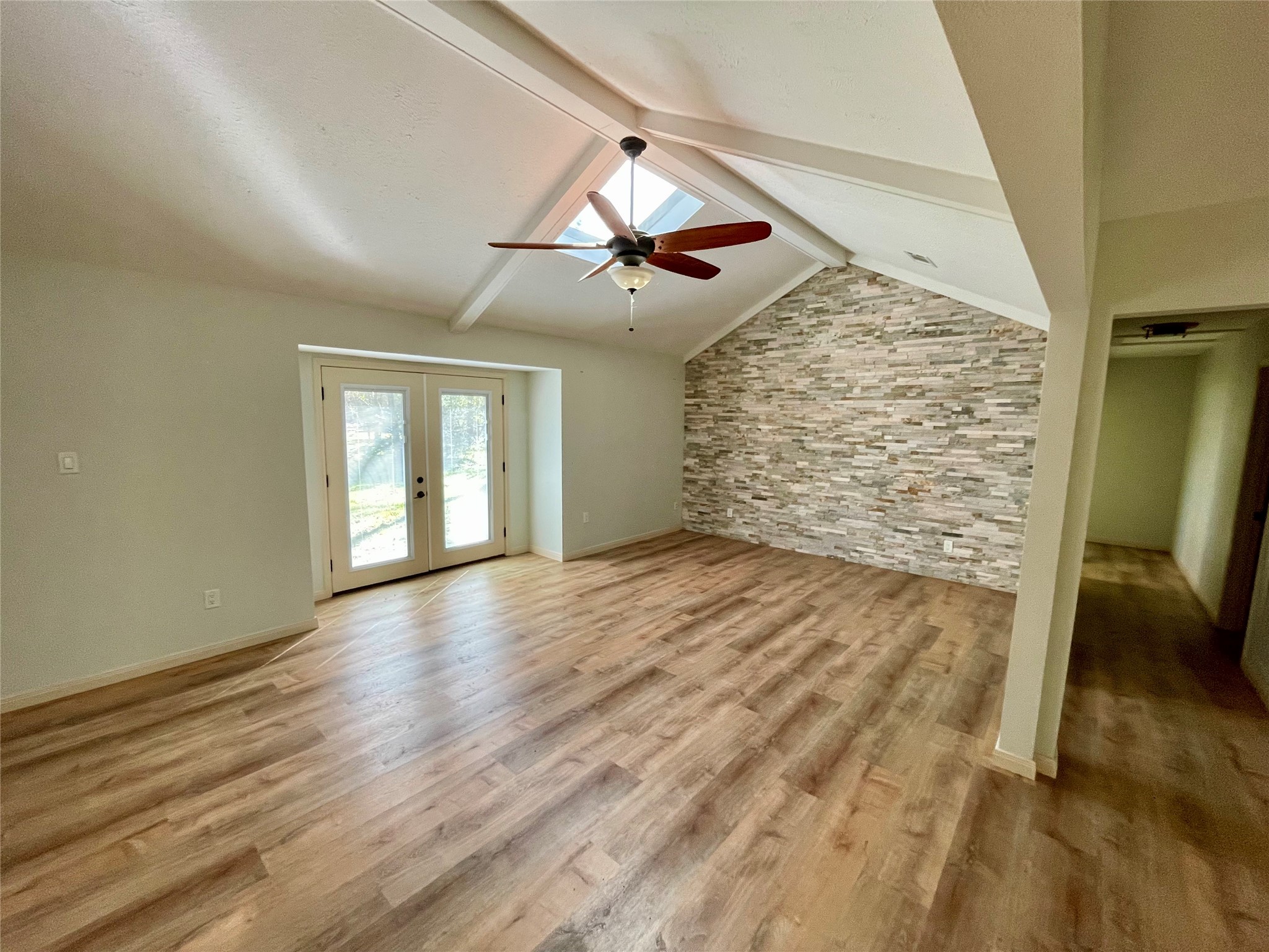 216 Woerner Road Houston, TX 77090 - Photo 10 of 33 a view of empty room with wooden floor