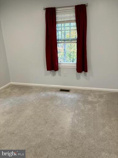 6803 Wild Rose Court Springfield, VA 22152 - Photo 29 of 49 a view of wooden floor and windows in a room