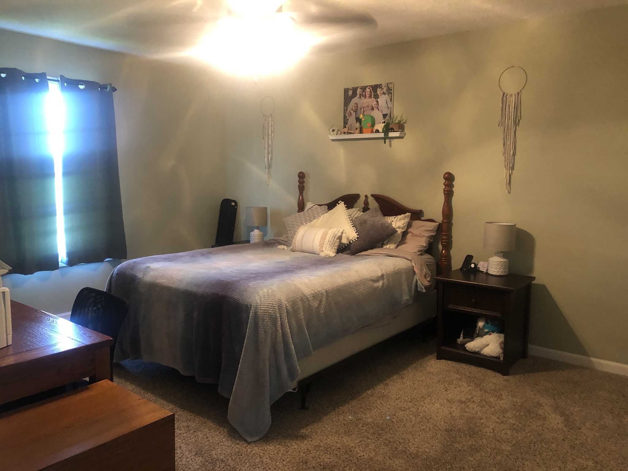 1895 Days Road Lafayette, TN 37083 - Photo 9 of 13 a bedroom with a bed and a lamp with window