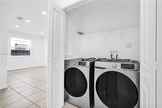 a view of a storage & utility room with wooden floor