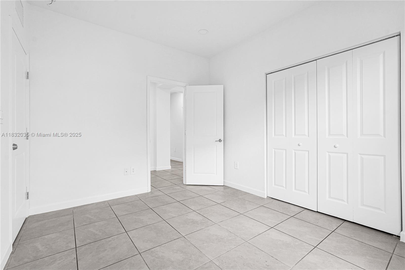 12735 Southwest 211th Street, Unit 12735 Miami, FL 33177 - Photo 15 of 45 a view of an empty room