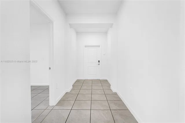 a bedroom with a bed and a cabinets