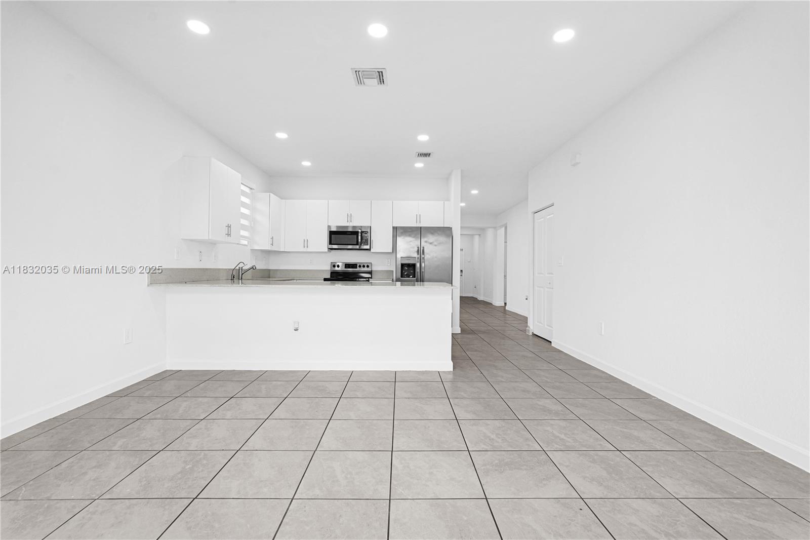 12735 Southwest 211th Street, Unit 12735 Miami, FL 33177 - Photo 31 of 45 a view of a kitchen