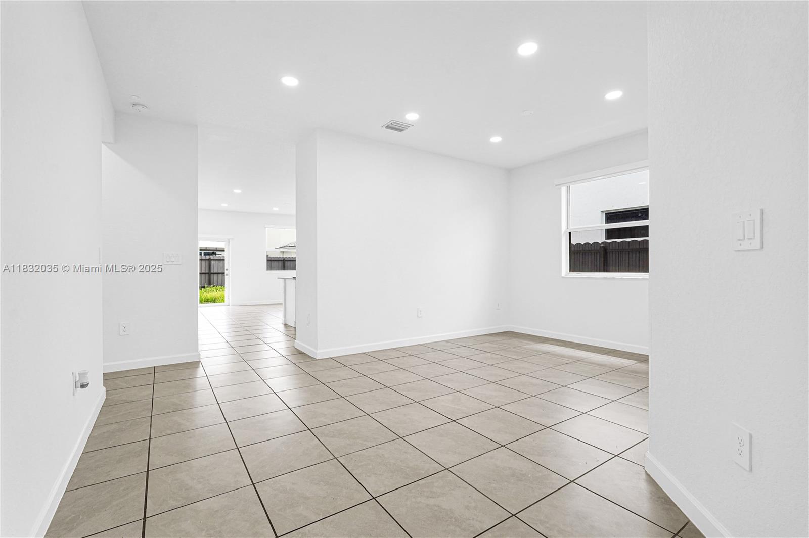 12735 Southwest 211th Street, Unit 12735 Miami, FL 33177 - Photo 39 of 45 a view of an empty room