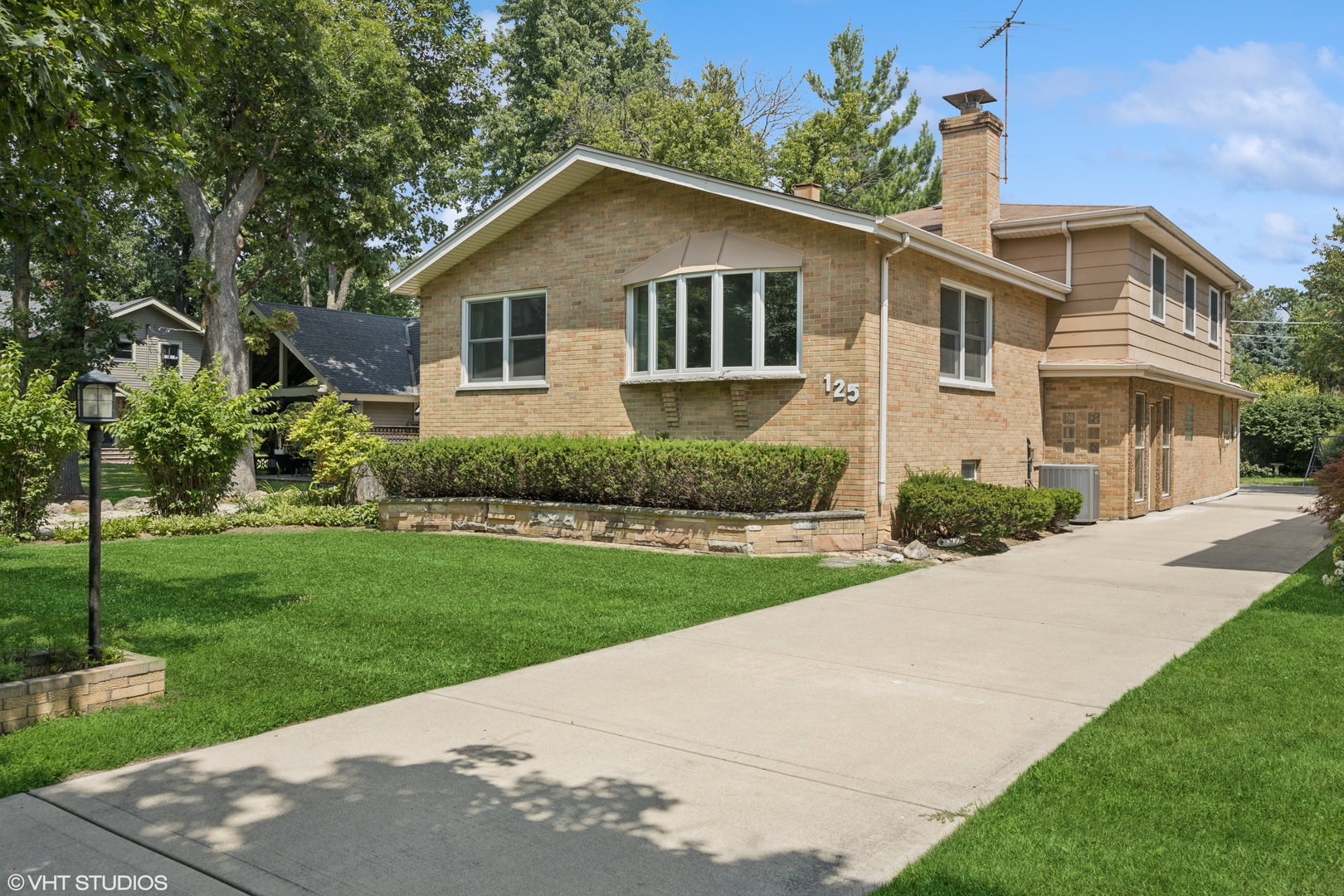 a view of a yard in front of house