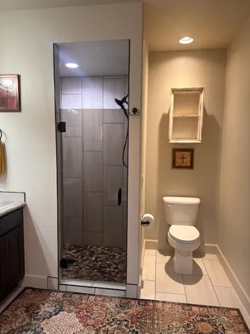 a bathroom with a sink a double vanity and a mirror