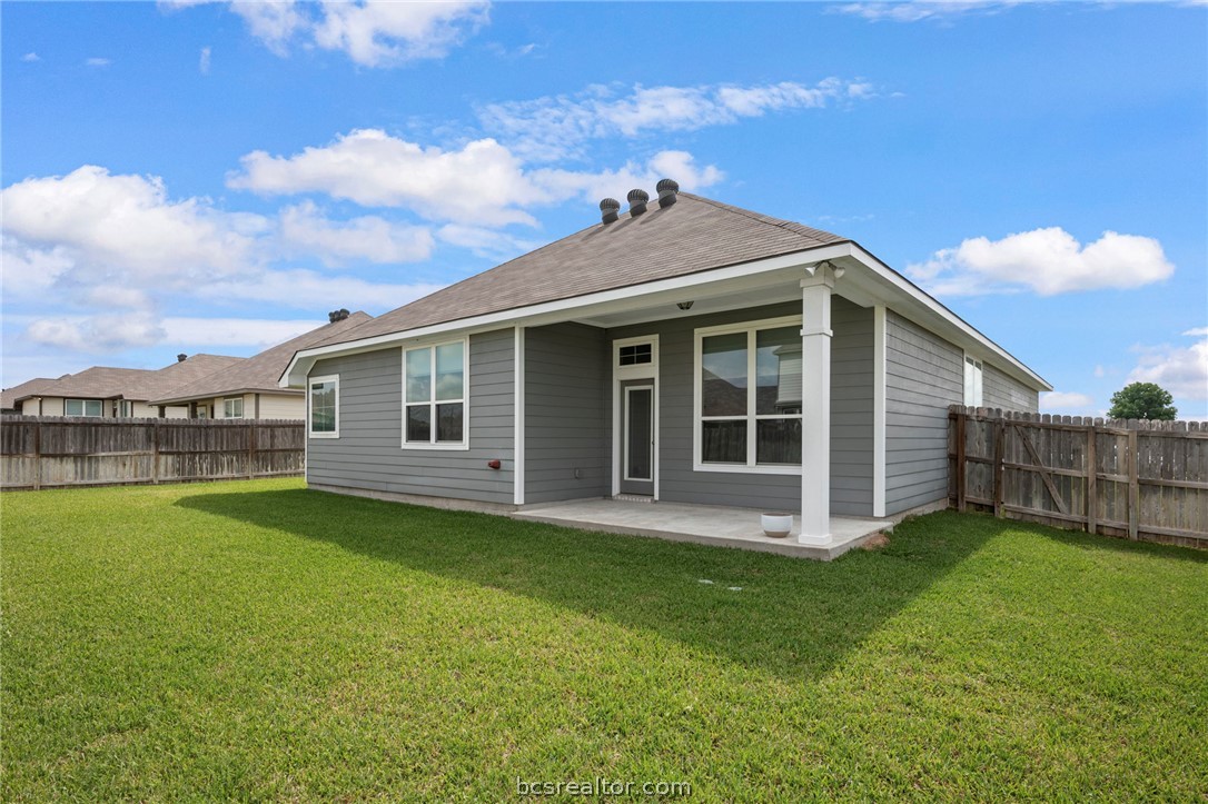 2038 Viva Road Bryan, TX 77807 - Photo 19 of 21 Fully fenced backyard with covered patio and plenty of room to play or garden.