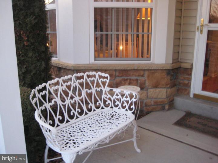 23 Brecht Road Hamilton, NJ 08690 - Photo 2 of 15 a view of porch with a bench