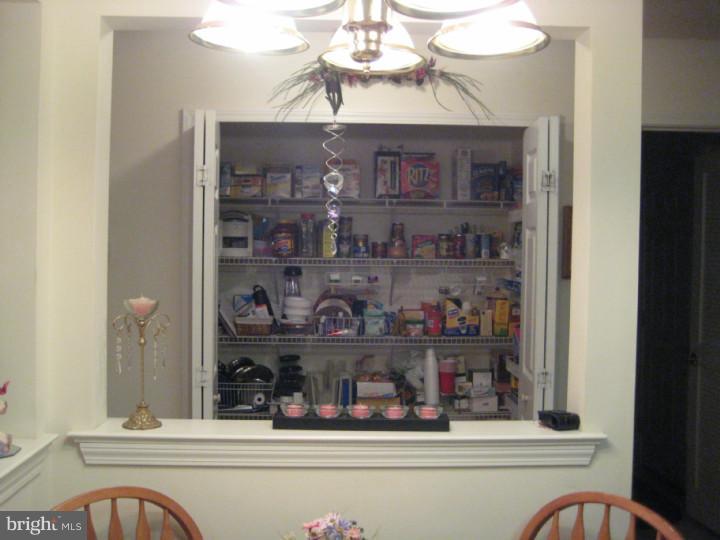 23 Brecht Road Hamilton, NJ 08690 - Photo 4 of 15 a room with a book shelf