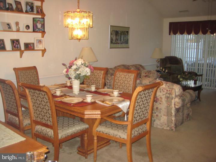 23 Brecht Road Hamilton, NJ 08690 - Photo 6 of 15 a dining room with furniture and chandelier