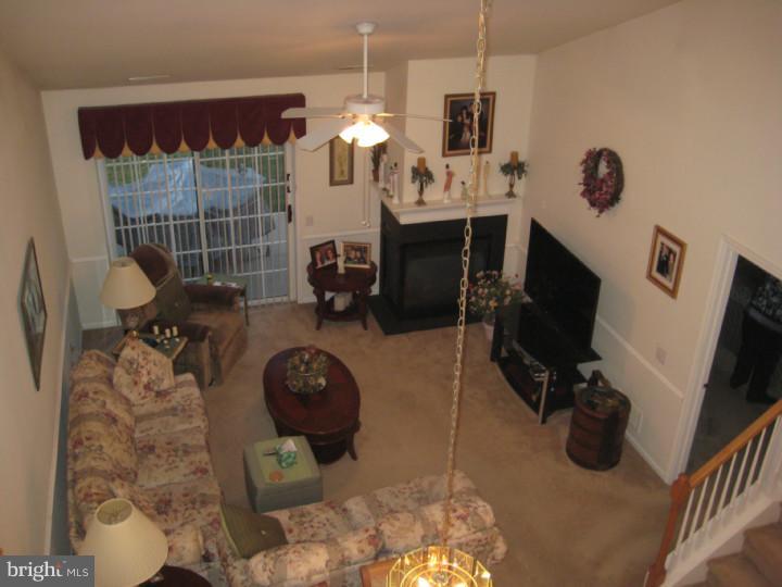 23 Brecht Road Hamilton, NJ 08690 - Photo 7 of 15 a view of living room with furniture and a flat screen tv