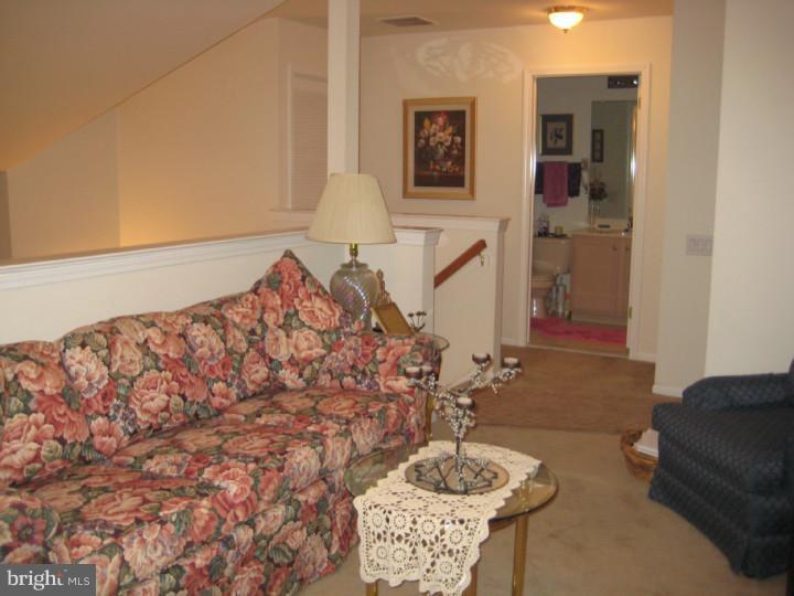23 Brecht Road Hamilton, NJ 08690 - Photo 10 of 15 a bedroom with bed and cabinets