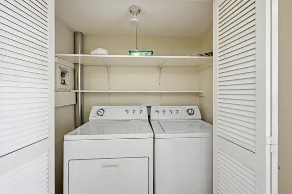 a utility room with dryer and washer