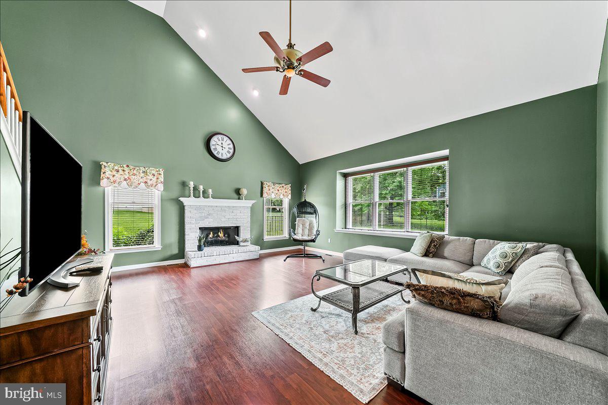 408 Brentford Road Kennett Square, PA 19348 - Photo 12 of 41 a living room with furniture fireplace and a flat screen tv