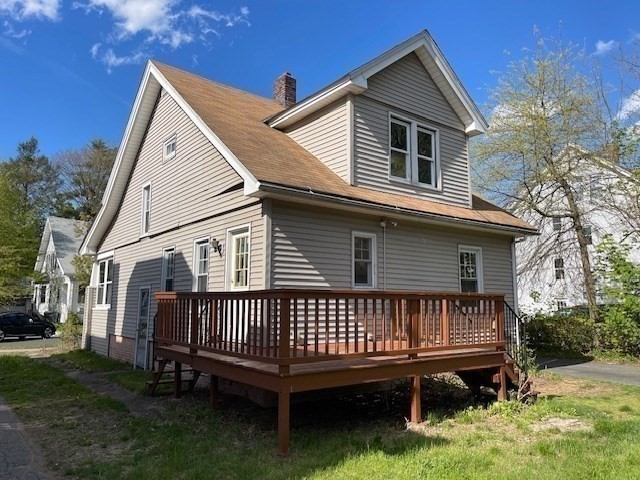 19 Taft Street Springfield, MA 01108 - Photo 6 of 21 a view of a house with a yard and deck