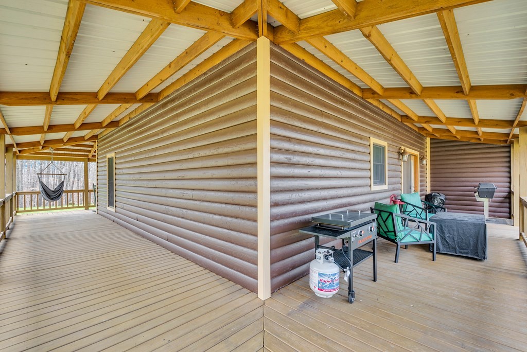 465 Hickory Lane Sparta, TN 38583 - Photo 7 of 46 a view of a porch with furniture and wooden floor