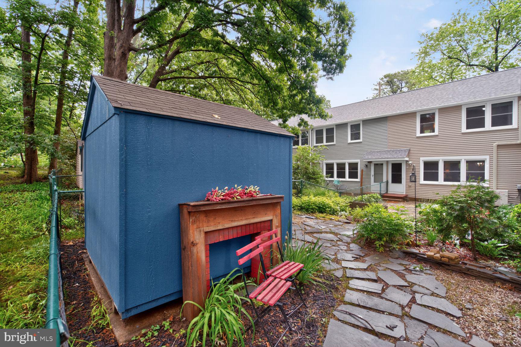 51 Ridge Road Greenbelt, MD 20770 - Photo 17 of 23 a backyard of a house with outdoor seating