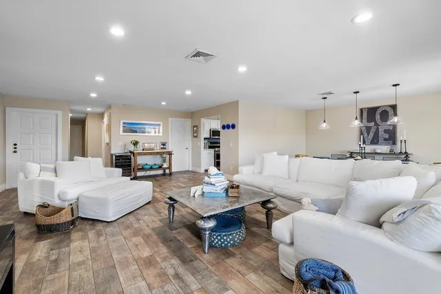 a living room with furniture and a table