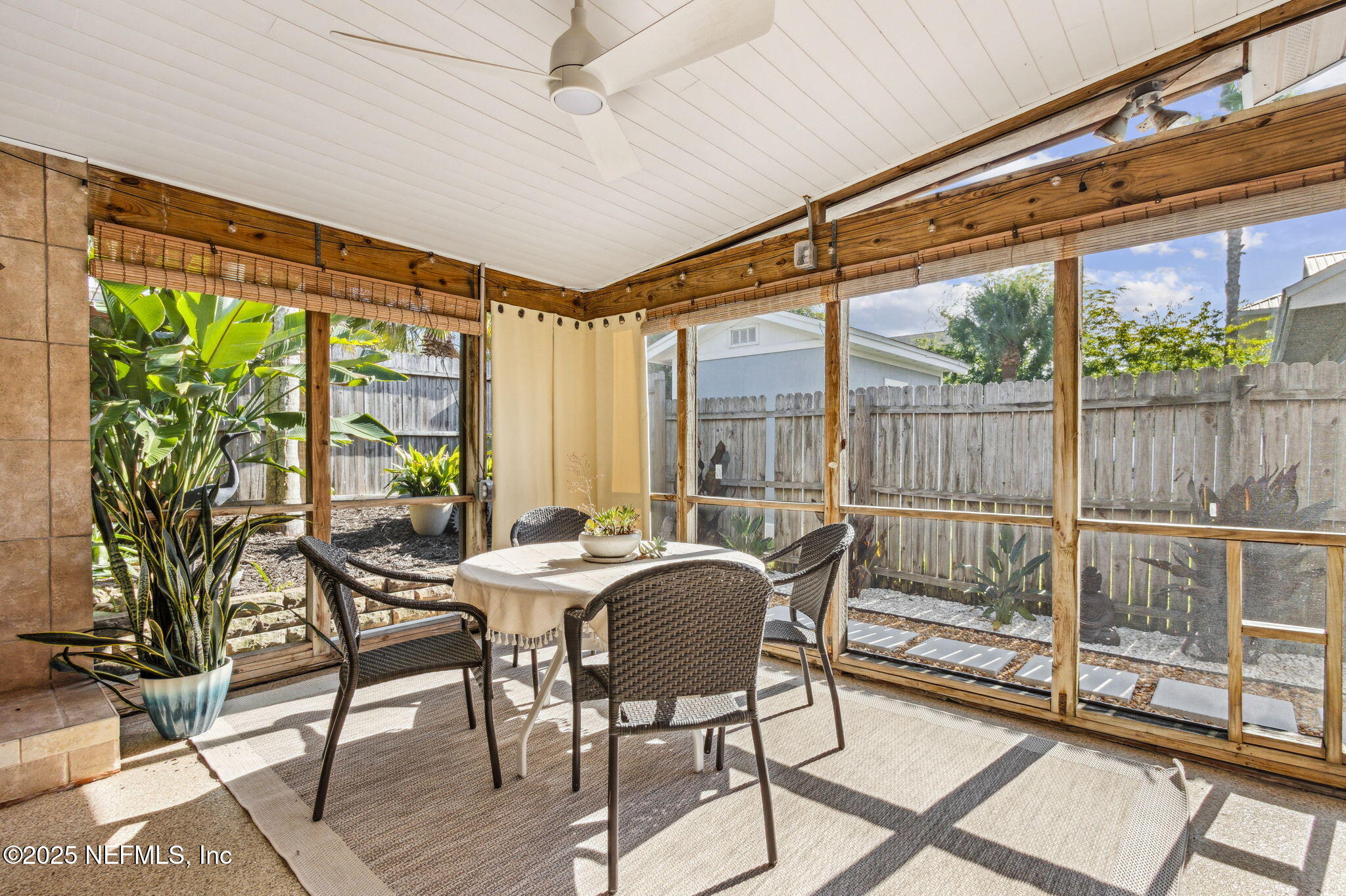 2751 West 5th Street, Unit B Fernandina Beach, FL 32034 - Photo 39 of 61 a view of a dining room with furniture window and outside view