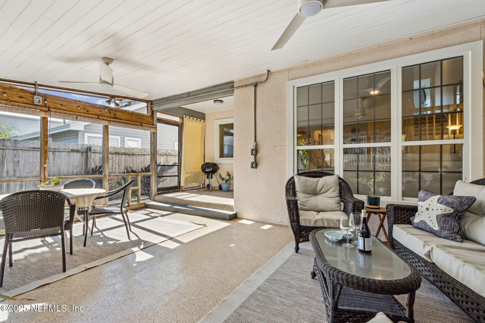2751 West 5th Street, Unit B Fernandina Beach, FL 32034 - Photo 43 of 61 a living room with furniture and a large window