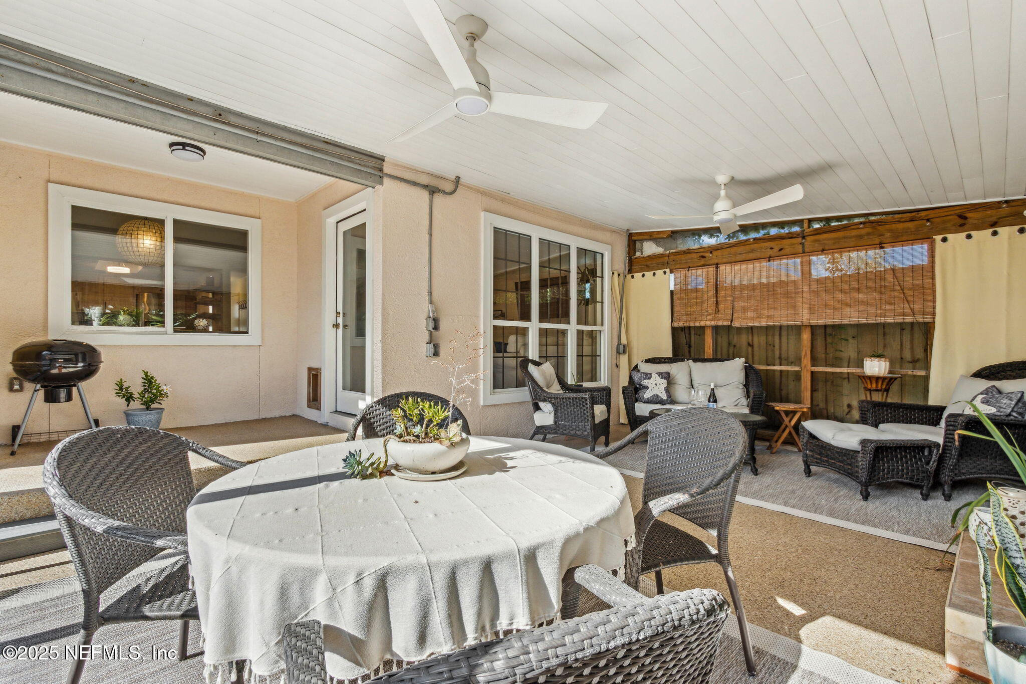 2751 West 5th Street, Unit B Fernandina Beach, FL 32034 - Photo 44 of 61 a view of a dining room with furniture window and outside view