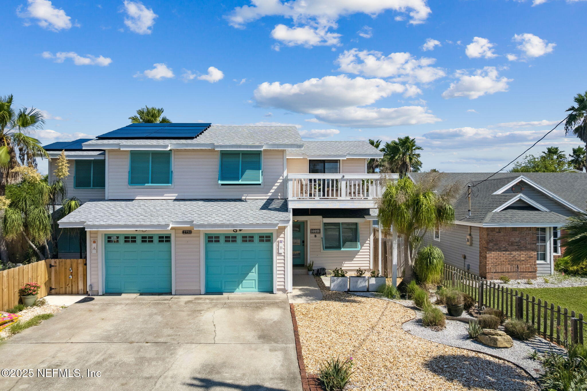 2751 West 5th Street, Unit B Fernandina Beach, FL 32034 - Photo 49 of 61 a front view of a house with a yard
