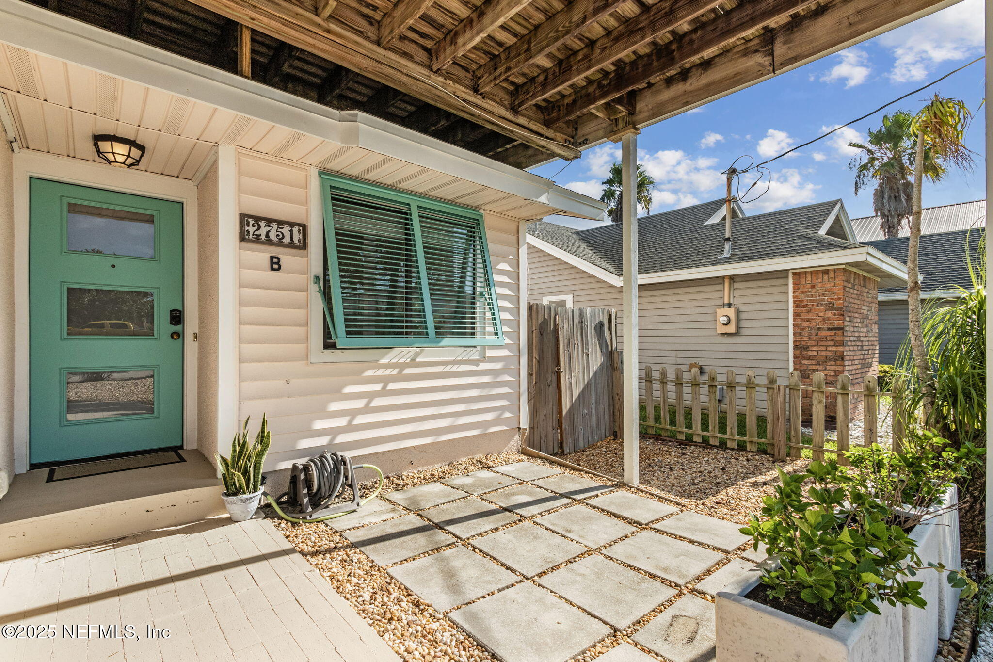 2751 West 5th Street, Unit B Fernandina Beach, FL 32034 - Photo 10 of 61 a view of a porch with furniture