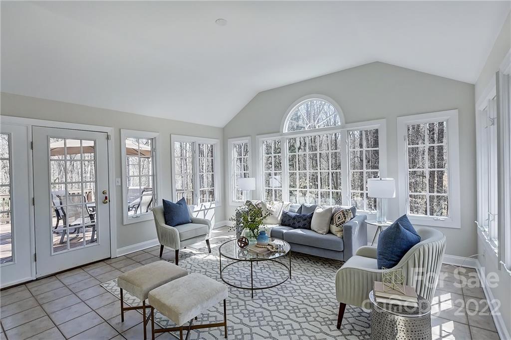 4222 Kronos Place Charlotte, NC 28210 - Photo 22 of 46 a living room with furniture and a large window