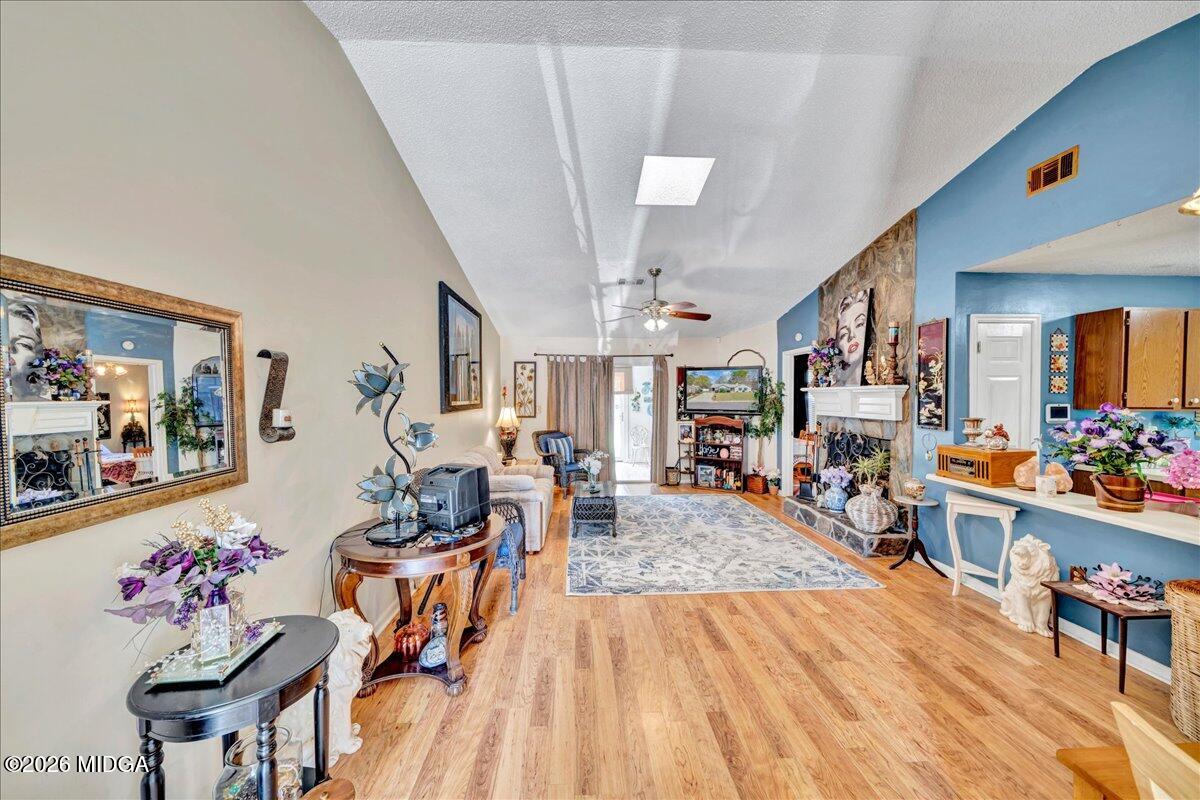 122 Wesleyan Way Macon, GA 31210 - Photo 5 of 20 a living room with furniture and wooden floor