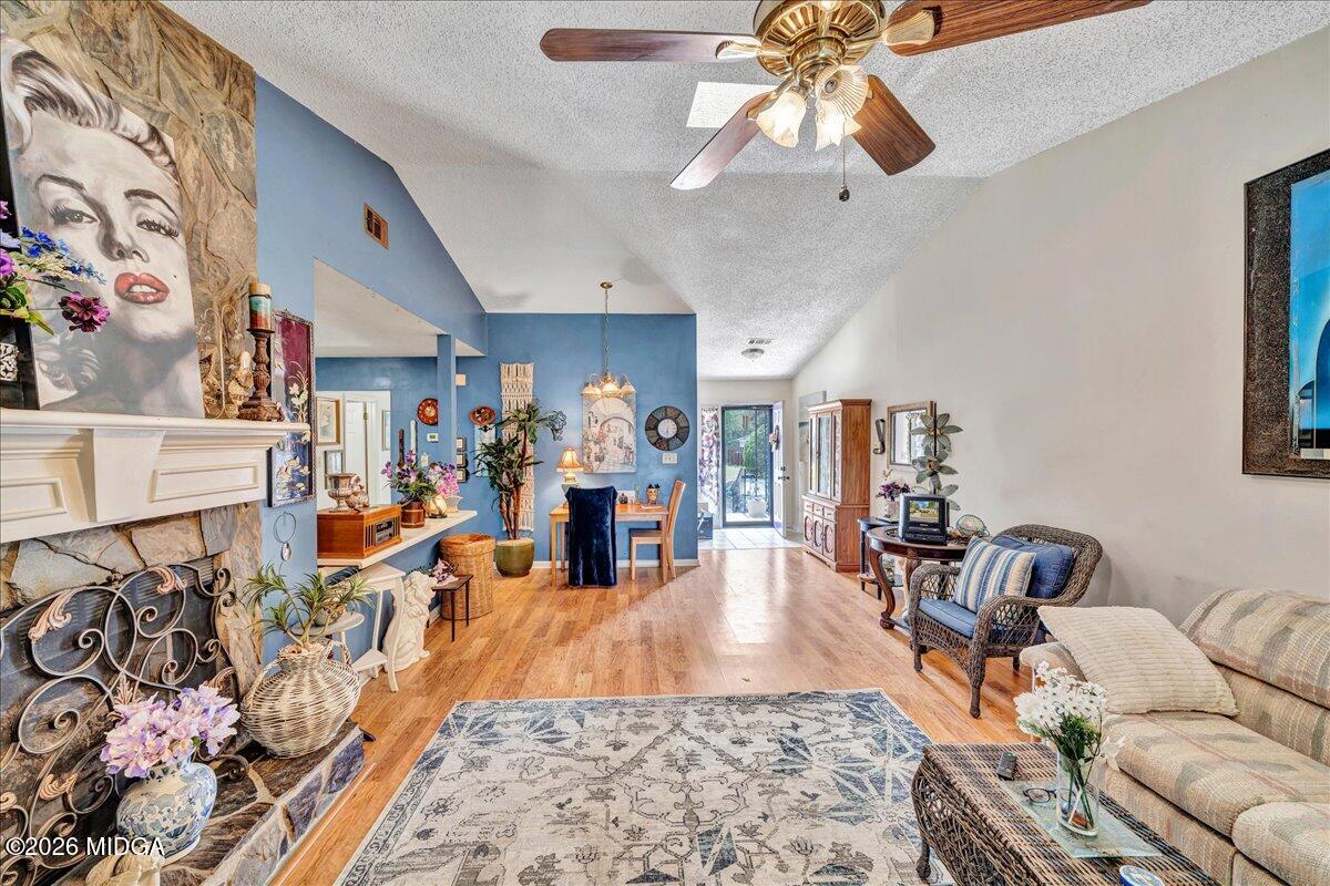122 Wesleyan Way Macon, GA 31210 - Photo 7 of 20 a living room with furniture and wooden floor
