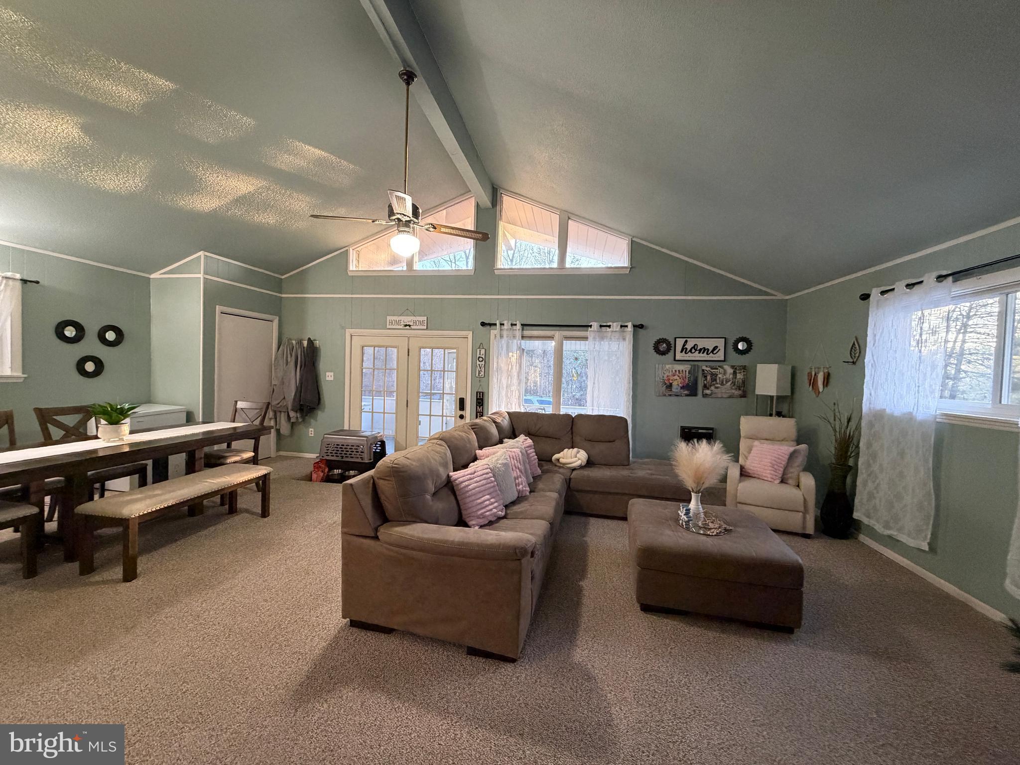 359 Straton Way Basye, VA 22842 - Photo 11 of 38 a living room with furniture and a large window